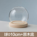 boule verre transparent socle bois décoration d'intérieur moderne objet d'exposition moderne