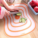 planche découper transparente anti dérapante blanc orange moderne rayures concentriques