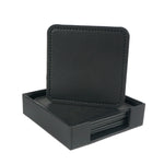 Boîte de rangement pour sous-verres en cuir noir avec motif piqué.