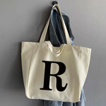 sac main femme toile beige clair lettre noire poignées détachables