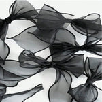 guirlande décorative festives rose noeuds tissu texturé semi transparent mariage anniversaire fille préparation naissance