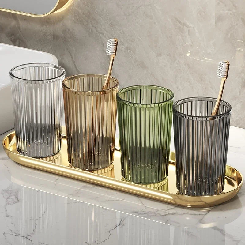 verres dents moderne transparents rayures verticales adhésifs élégants verte dorée grise brosse tube