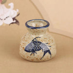 vases céramique artisanal poissons fleurs blanc bleu rouge vert