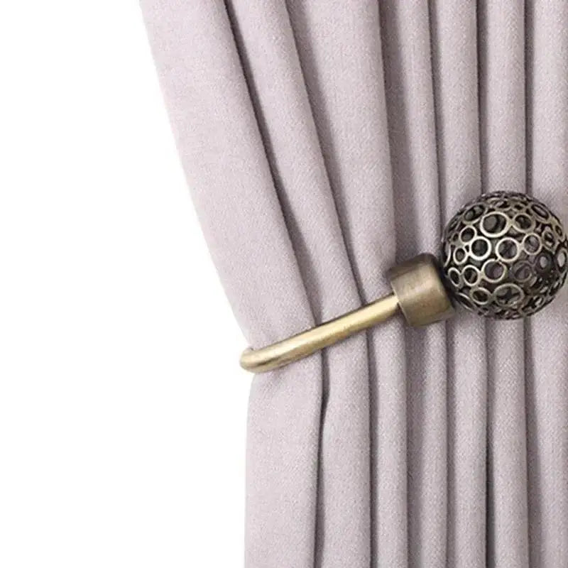 boucle rideau métal bronze argenté doré cuivre moderne élégante perforée sphérique