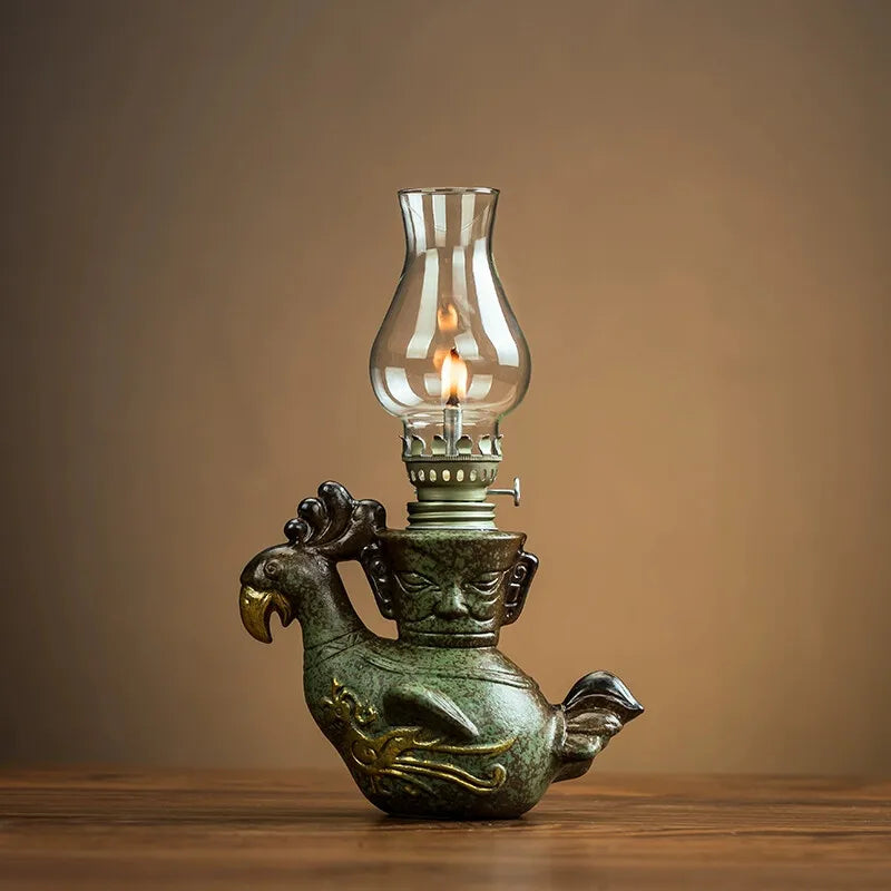 lampe huile vert verre transparent base grès doré oiseau stylisé vintage oriental décoration intérieure