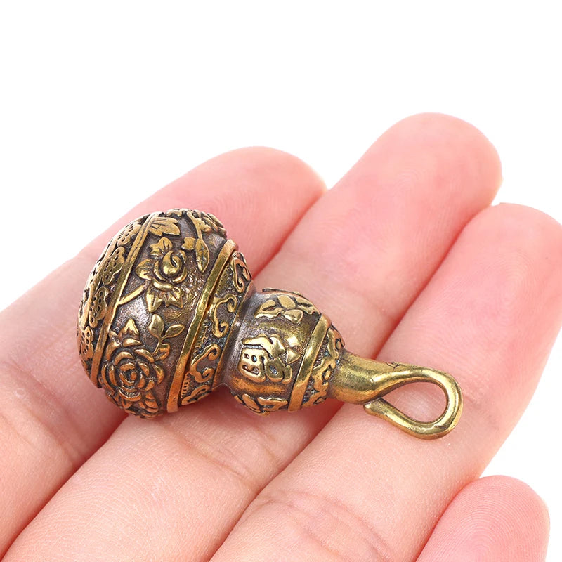 porte bonheur cuivre doré motif floral traditionnel asiatique anneaux suspension