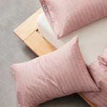 taies d'oreiller coton rayées 48x74cm blanc gris rose bleu minimaliste respectueux environnement maison lit