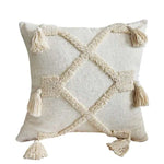 coussin carré beige motif losange texture bouclée décoration maison boho franges