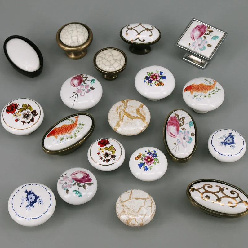 boutons meuble céramique blanc or noir fleurs poissons géométriques classiques