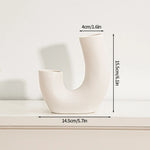 vases blancs modernes céramique rondes lignes horizontales décoration intérieure simple