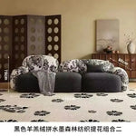 canapé moderne noir blanc fleurs motifs abstraits coussins plateau bois minimaliste italien scandinave