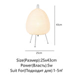 lampe table moderne blanc rayures horizontales fines opacité tringles noires câble noir led étude