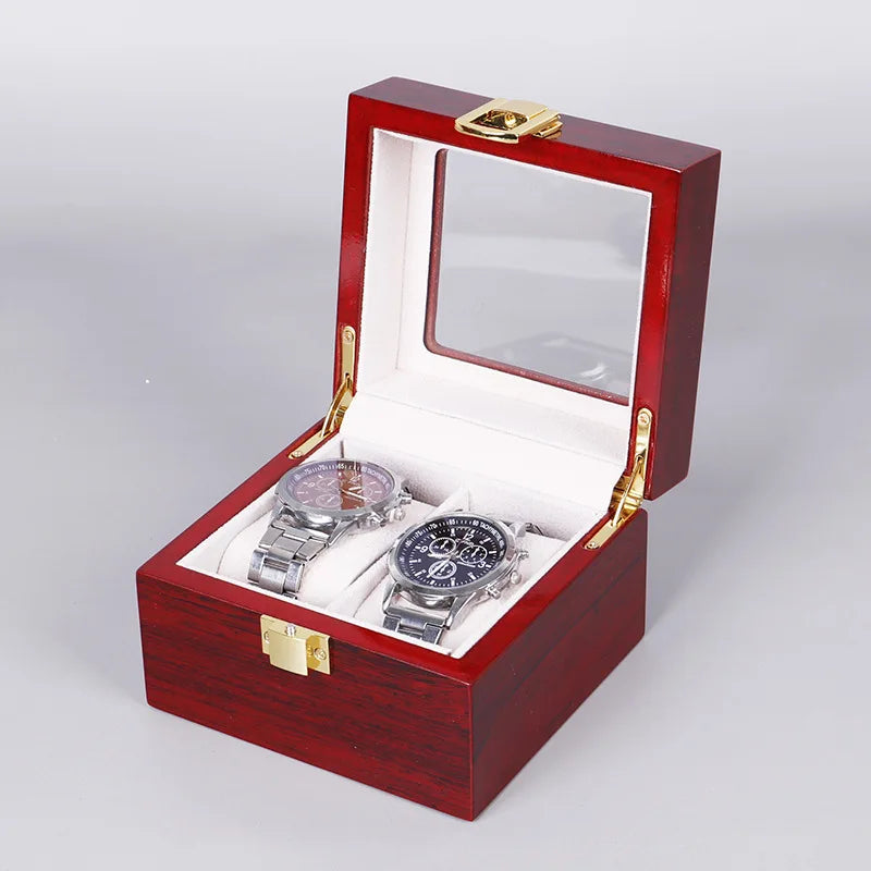 boîtes montres marron foncé compartiments bois luisants poignées dorées classiques organisateur montres luxueuses