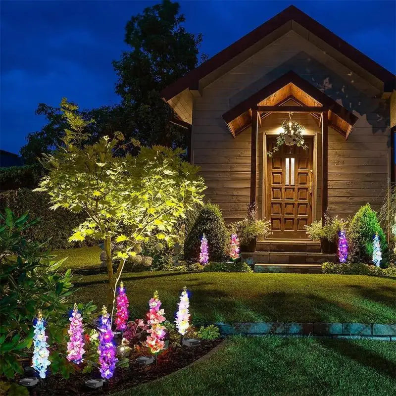 décoration extérieure fleurs lumineuses solaires jaune bleu rose violet piquet métallique moderne festive jardin