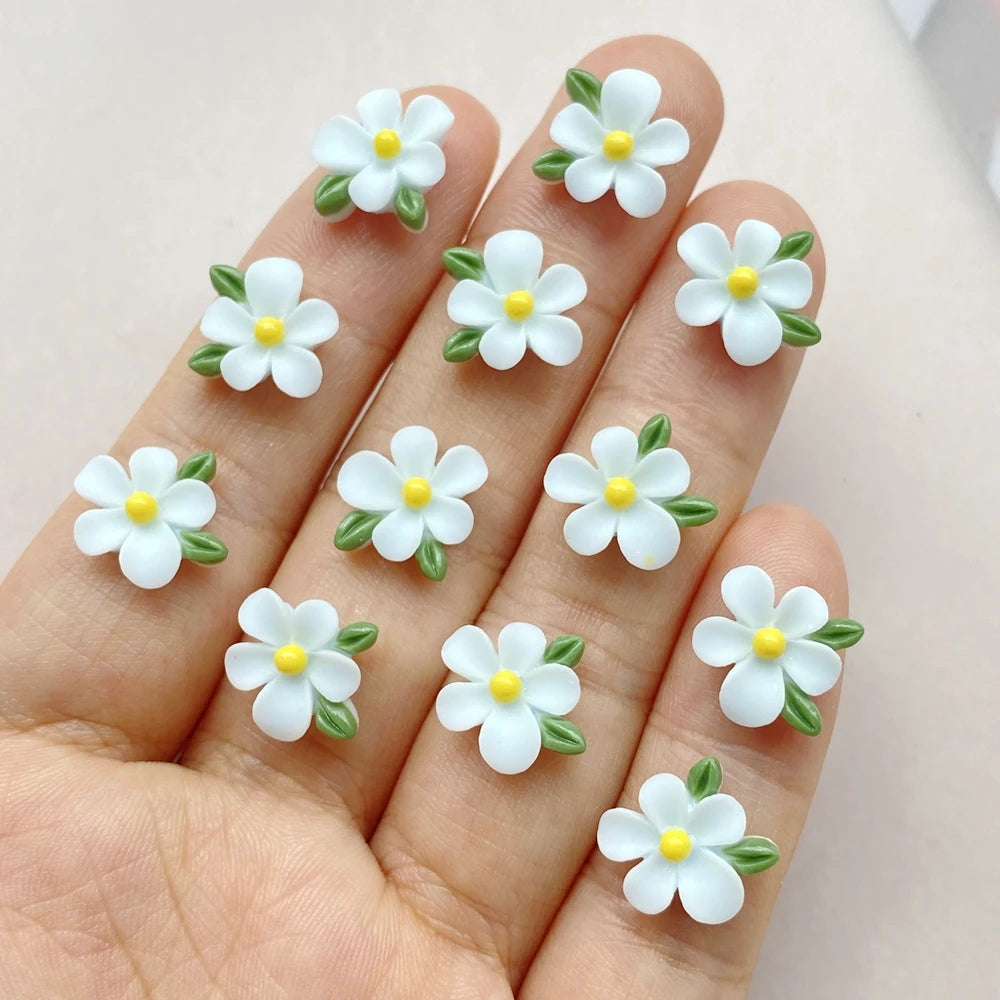 bijoux décoration ongles nail art fleurs colorées résine minimalistes blanc rose bleu vert jaune
