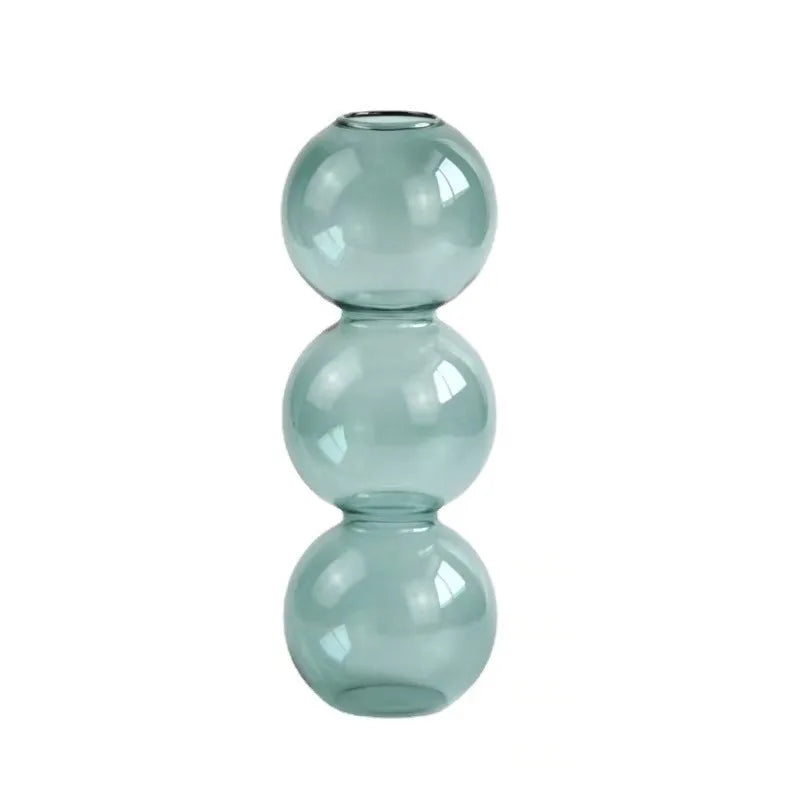 vases transparents modernes sphères empilées bleu vert marron beige