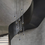 suspension lumineuse argentée gouttes pluie contemporaine fil 2000 82000 lumens chambre salon étude