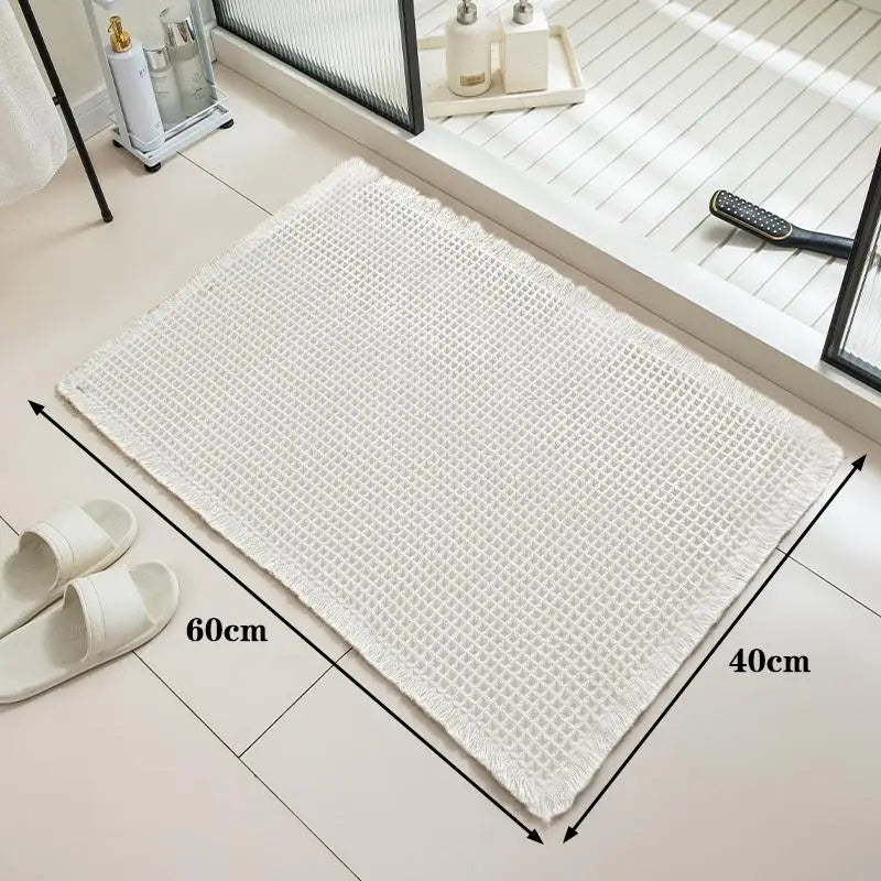 tapis bain beige clair gaufré antidérapant franges moderne dimensions 60x40cm