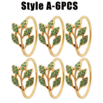 anneaux décoratifs élégants feuilles stylisées strass doré argenté vert décoration table événement