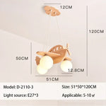 lampe suspendue bois naturel blanc texture moderne sphères translucides fixations chaines ailes gouvernail propulseur