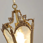 lampe suspendue or blanc translucide verre taillé ornements dorés classique baroque chaîne métallique