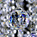 boule cristal transparente facettes géométriques moderne élégante anneau métallique suspension décoration intérieure très transparente