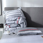 taies d'oreiller rectangulaires bleu clair gris motifs géométriques moderne non toxique 100 polyester 48x74cm