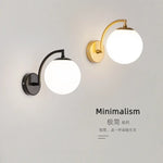 lampe murale moderne minimaliste noir doré éclairage cuisine entrée étude verre rond LEDflux lumineux