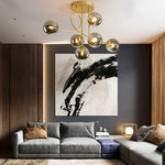 lampe suspendue moderne boules sphériques or noir gris dégradé blanc lait cognac