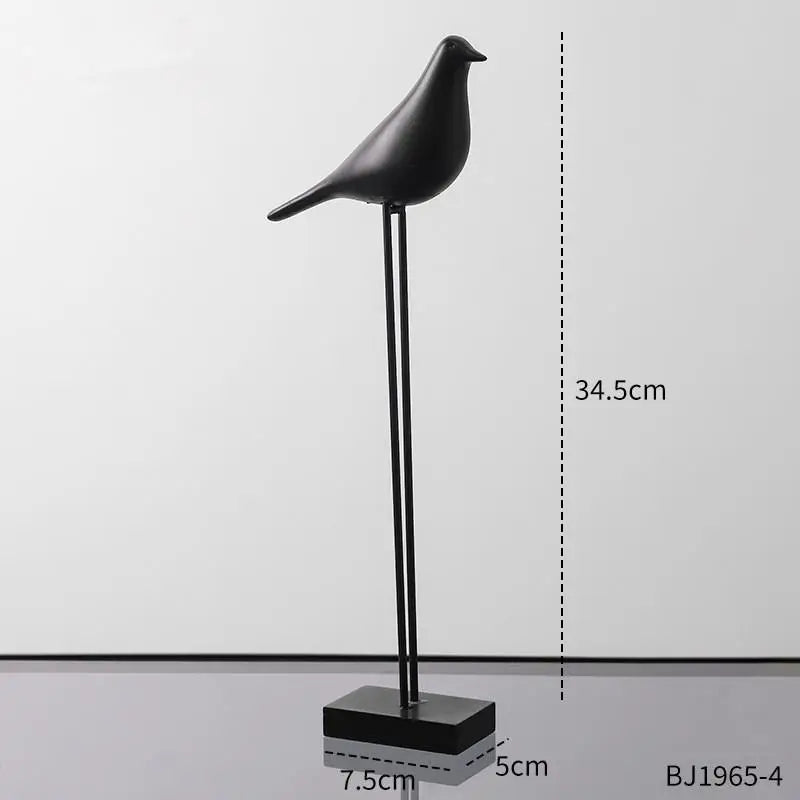 statues oiseaux noir blanc minimaliste sculpture deco intérieur base plate pieds minces