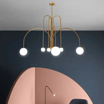 suspension lumineuse moderne sphères translucides structure métallique or rouge brun lumière led chambre salon