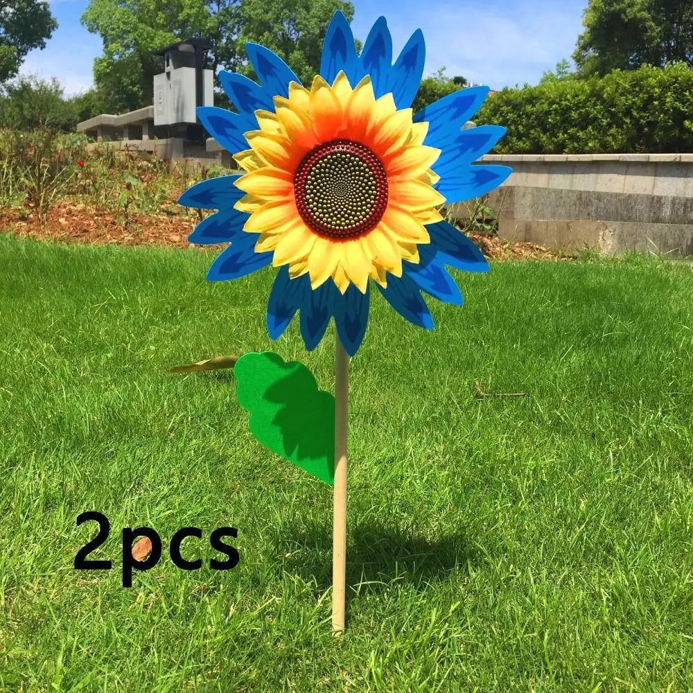 décoration extérieure fleur artificielle jaune rouge bleu vert rayonnante pétale verte tringle jardin cour