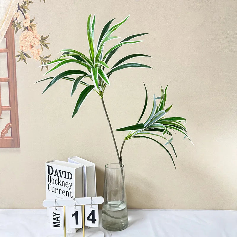 plantes artificielles vertes feuilles fines décoration intérieure moderne branchies striées minimalistes
