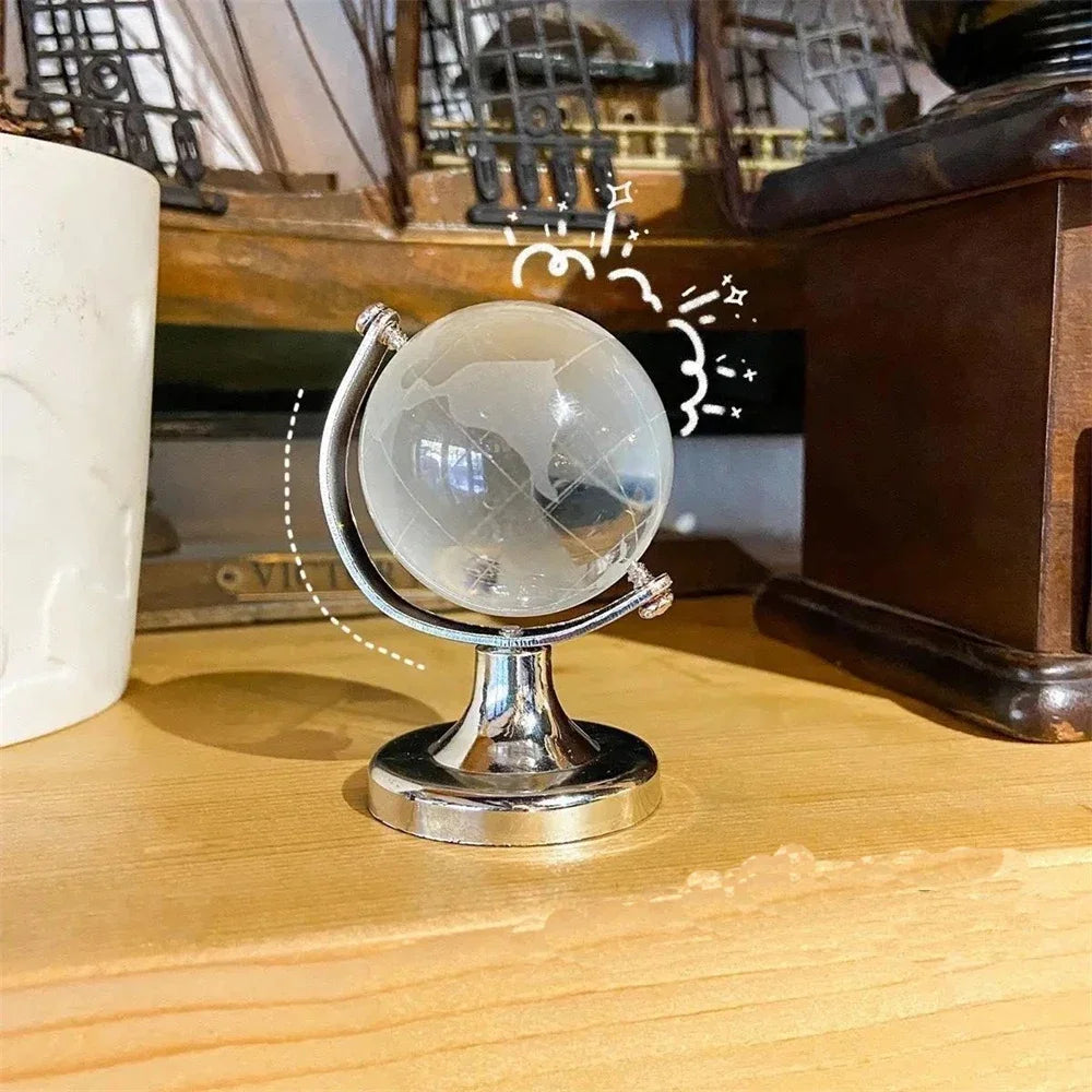 globe terrestre transparent relief gravé support métallique doré argenté élégant décoration pedagogique enfants collection