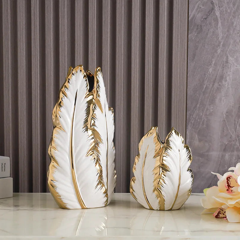 vases modernes blanc doré plume surface brillante unique élégant intérieur sophistiqué formes feuille