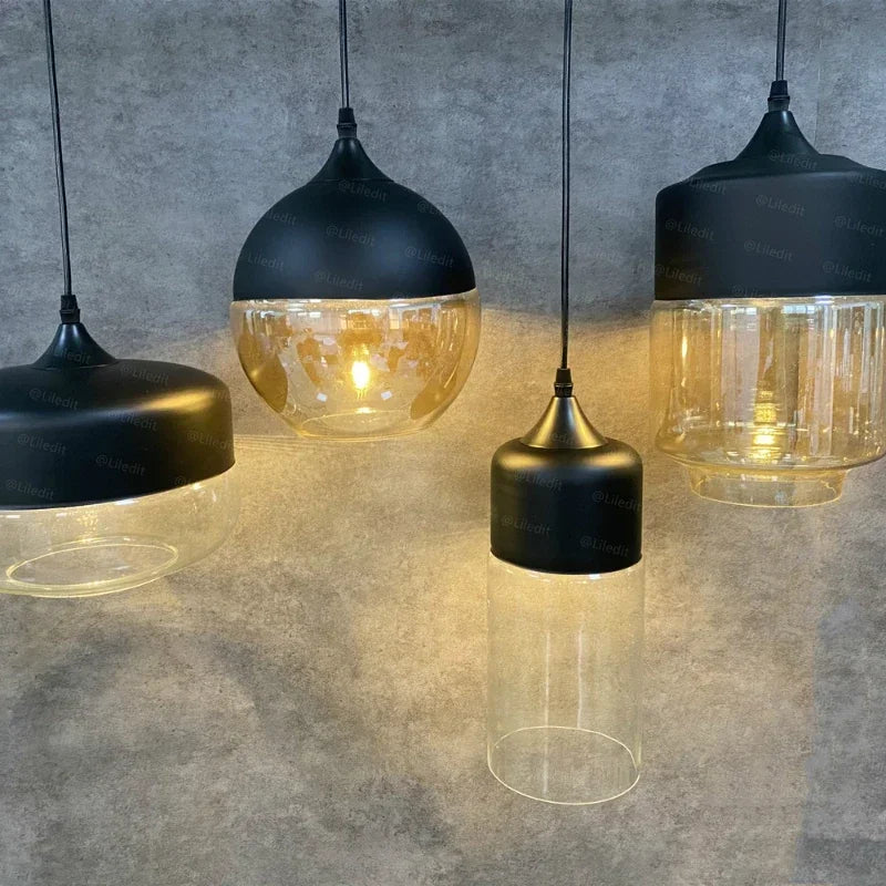 suspension lumineuse moderne pendentif verre noir transparent contemporain fixation câble luminaire salle manger chambre