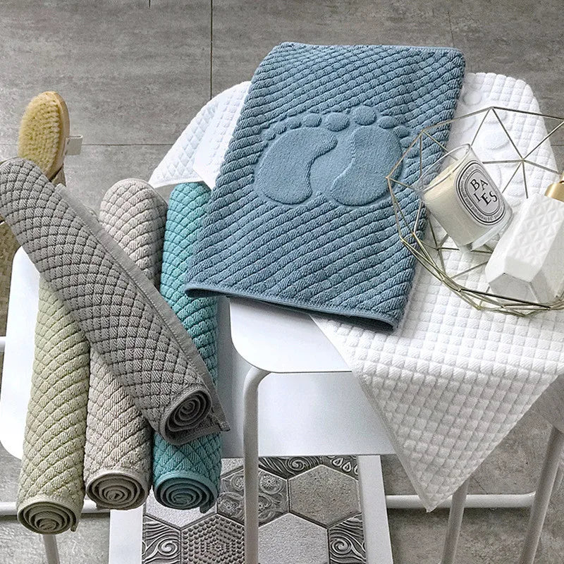 tapis bain coton absorbant motif pieds moderne vert clair gris bleu clair