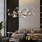 suspension luminaire branches cuivre fleurs artificielles moderne noir blanc salon salle manger intérieur
