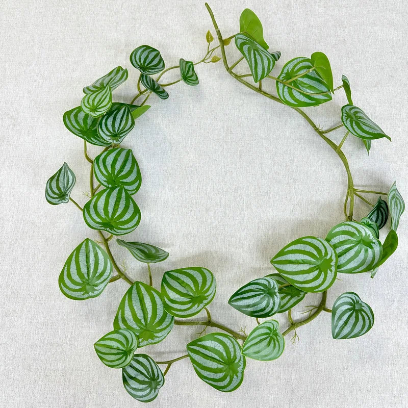 guirlande végétale artificielle feuilles ovales vert veinées tiges extérieure décoration naturelle exposition accrochée