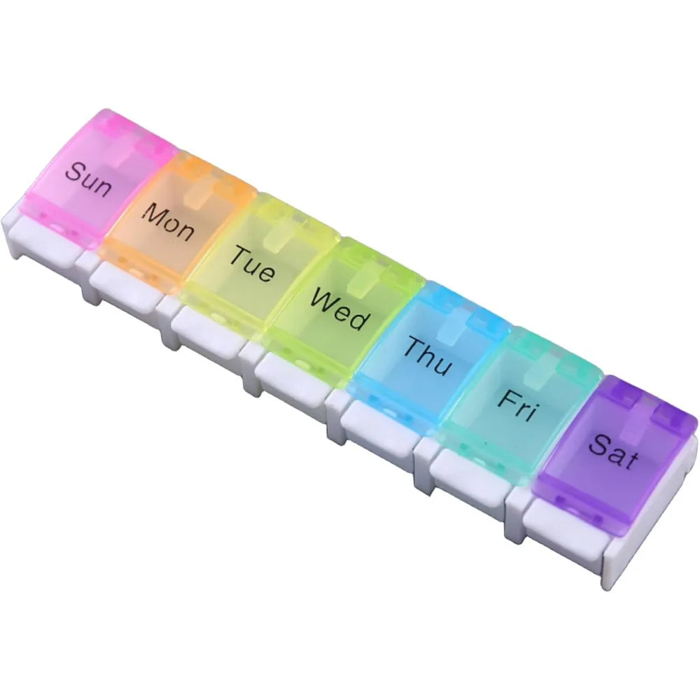 boîte pilules transparente moderne compartiments semaines couleurs rose orange verte bleu violet blanc