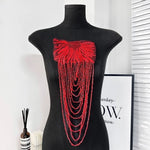 accessoire textile broche franges rouge or noir élégant chic festive decoration
