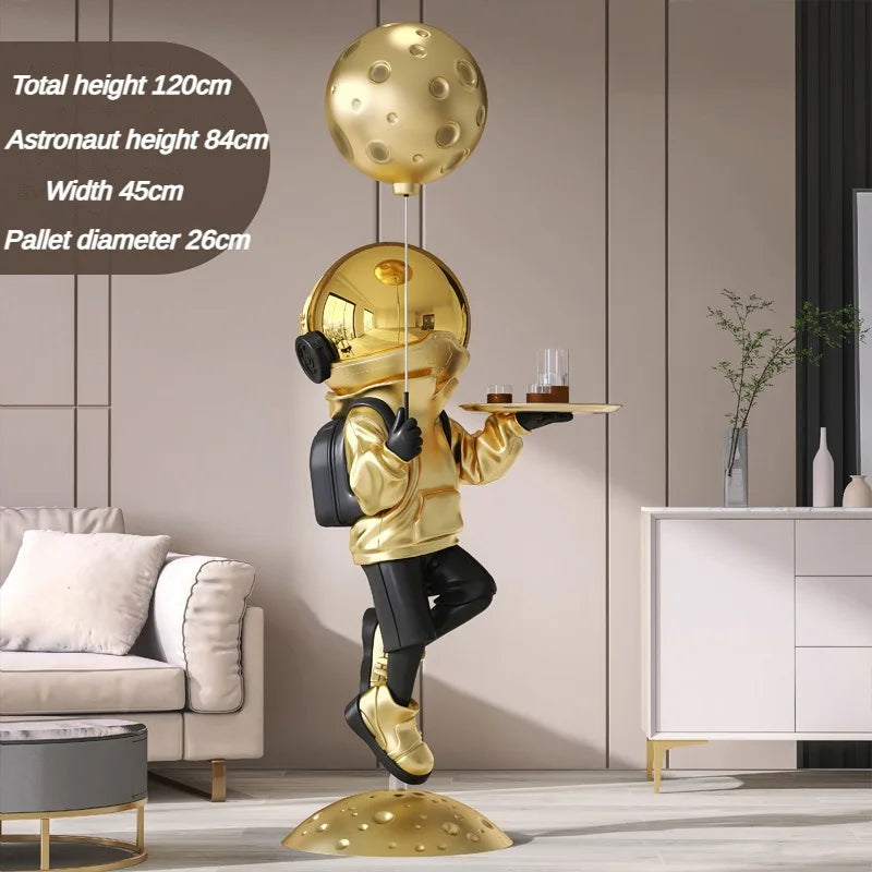 statuette astronaute résine couleur changeante doré argenté rose jaune moderne brillant métallique fixations