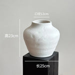 vase poterie moderne gris beige fleur séchée décoration intérieure texture marbrée lisse rustique arrangement