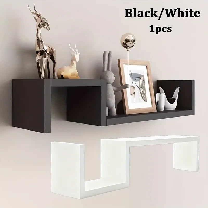 étagère murale moderne noire blanche rangement boîtes cadre photo vase horloge livre plante