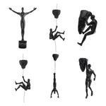 statues escalade homme résine noires texture rugueuse détail anatomique réaliste fixées