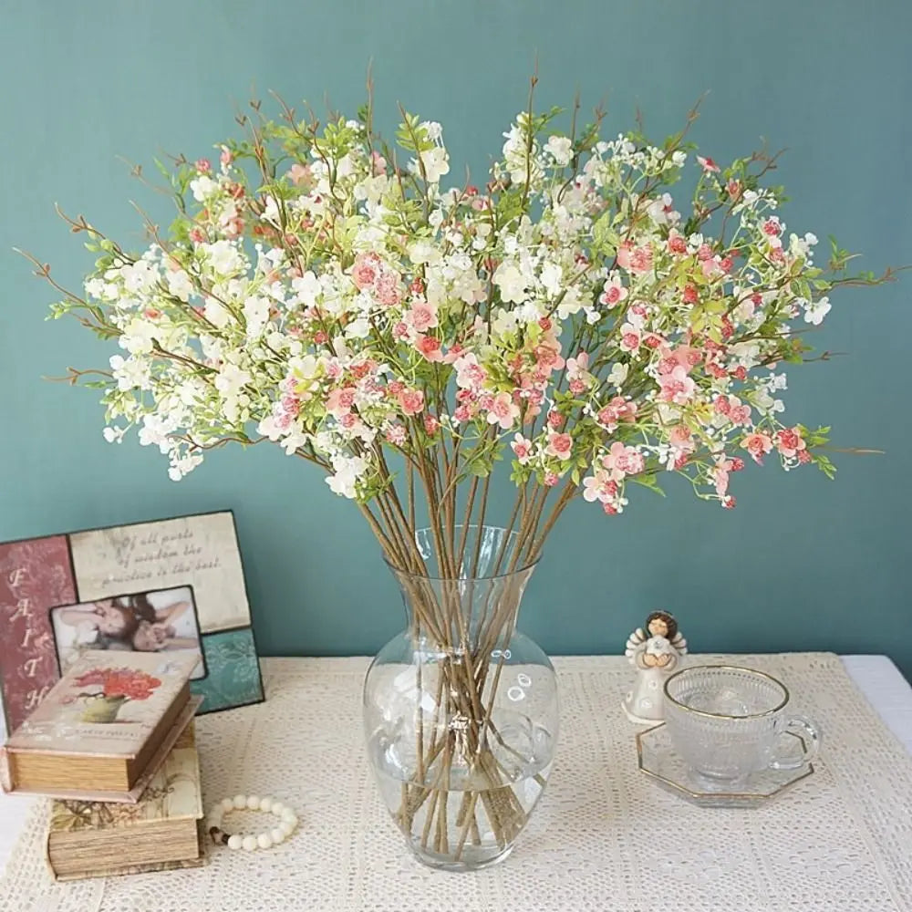 décoration intérieure fleurs artificielles soie rose blanc jaune vert branches feuilles vases transparents printemps