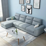 canapé d'angle moderne tissu uni vert pastel gris clair rose pâle jaune scandinave salon