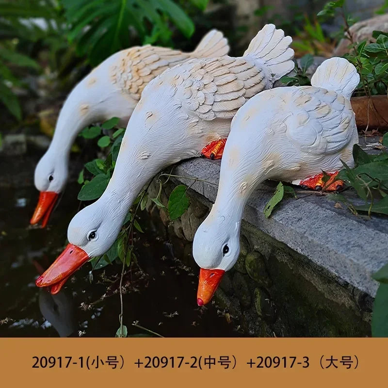 statue canard blanc plumes orange piscine jardin décoration extérieure animaux ornements paysagistes fleurs artificielles