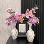 vase décoratif moderne minimaliste motif ondulé spirale opaque fleurs lilas violet table maison salon