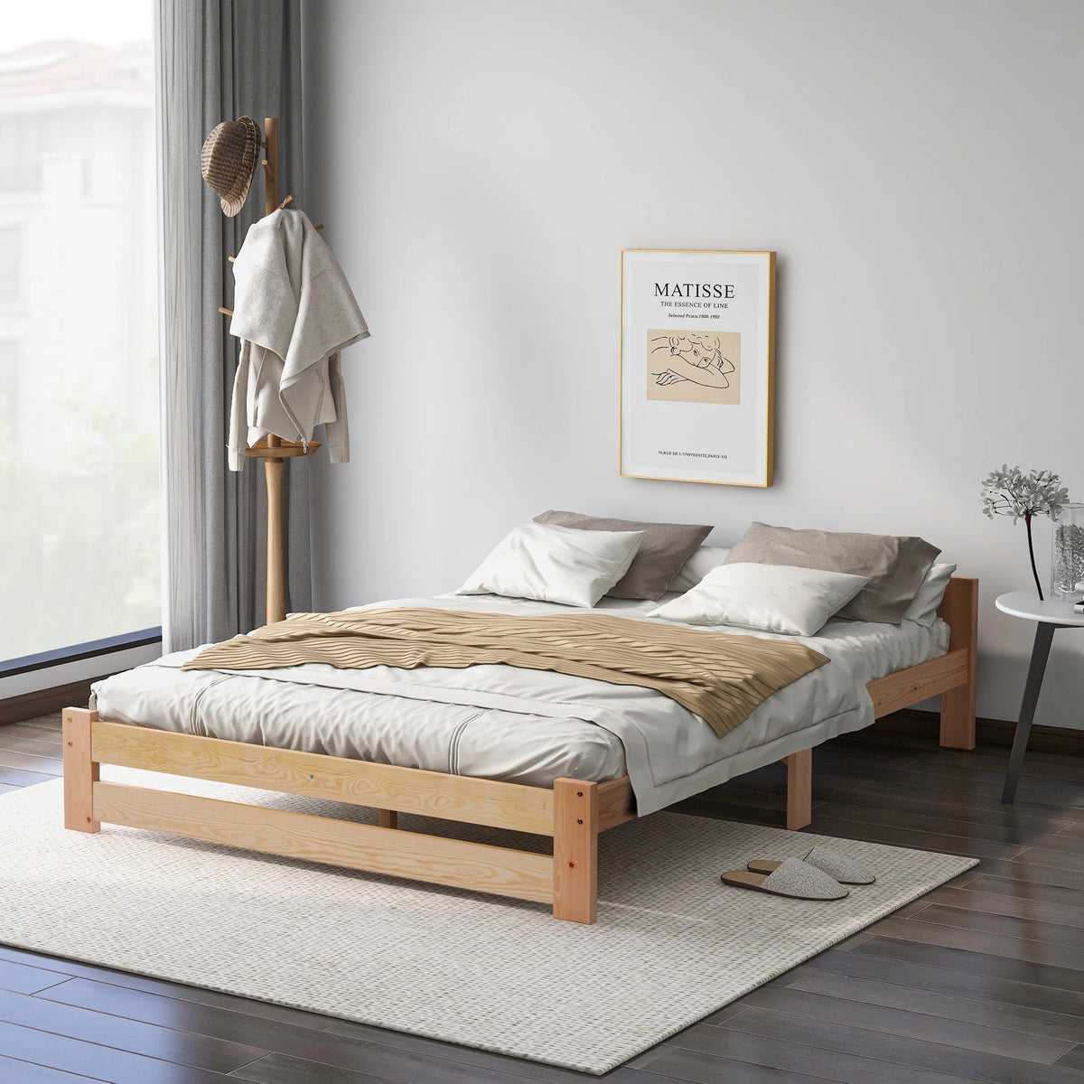 Détail du bois massif et de la finition naturelle du lit futon